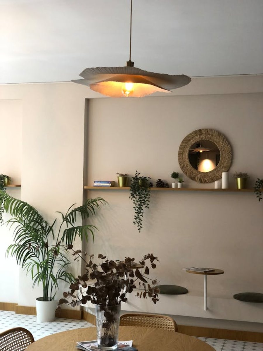 Café table with coffee and a croissant